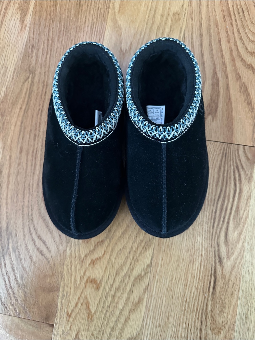UGG Kids Cozy Black Plush Slippers with Braided Trim | Slip-On Comfort Shoes